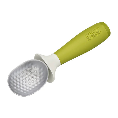 Green kitchen tool with textured gray head on a white background