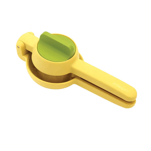 Yellow and green manual juicer on a white background