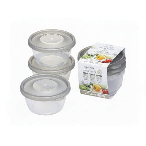 Three small translucent plastic food storage containers with lids are shown next to their retail box on a white background. The packaging is white with colorful food illustrations and Japanese text, including 'HOME PACK' and '250mL'.