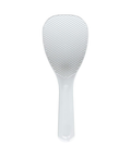 A white plastic rice paddle with a textured, dimpled surface on the head and a smooth handle, shown against a plain white background.
