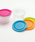 Set of colorful plastic lids on a white background