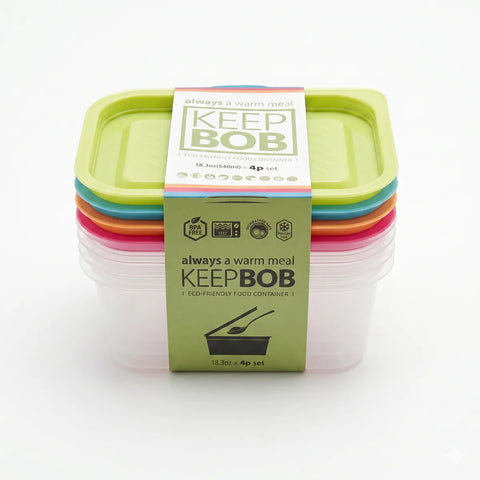 Stack of Keep Bob food containers with green lids on a white background
