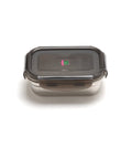 Metal food storage container with a clear lid on a white background