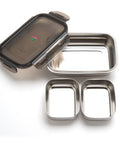 Stainless steel food container with black lids and removable inserts 