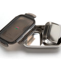 Stainless steel food container with a black lid on a white background
