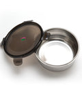 Stainless steel food container with black lid on a white background