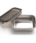 Stainless steel food container with black lid on a white background