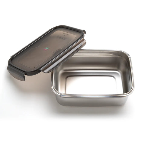 Stainless steel food container with black lid on a white background