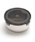 Stainless steel food container with black lid on a white background