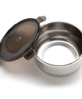 Stainless steel food container with black lid on a white background