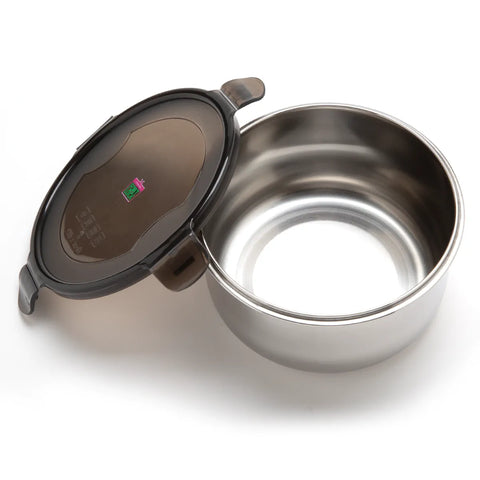 Stainless steel food container with black lid on a white background