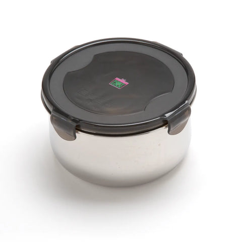 Stainless steel food container with black lid on a white background