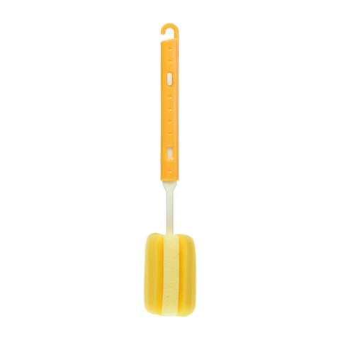 A yellow foam cleaning brush with a bright orange handle and a white plastic stem, shown against a plain white background.