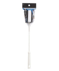 A long-handled cleaning brush with a white plastic handle and a black-and-white bristle head, packaged in clear plastic with a black header card on a white background.