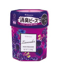 A hexagonal container of Shosyu Lavender Room Freshener, featuring a purple and magenta floral design with lavender illustrations and a white label in the center.