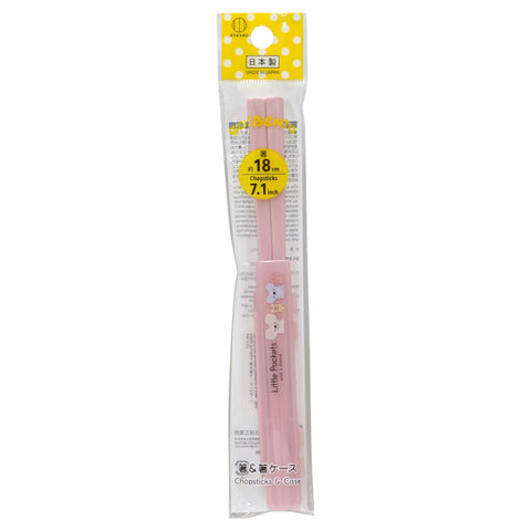 Pink chopsticks in a clear plastic package with a yellow polka-dot header card. The chopsticks have a small cartoon bear design and the text 'Little Pockets' printed on them.