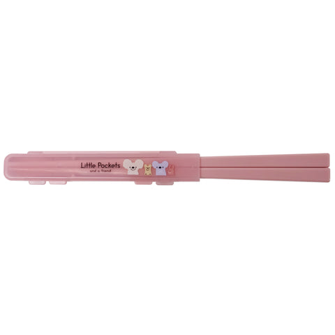 Pink plastic chopsticks in a matching case with 'Little Pockets' and cartoon characters printed on the front, shown against a plain white background.