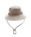 Beige bucket hat with brown band and strap on a white background