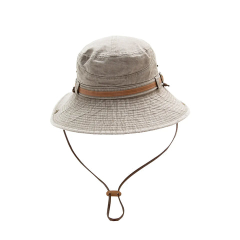 Beige bucket hat with brown band and strap on a white background