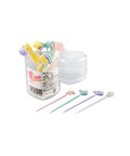A set of pastel-colored tooth picks with decorative shapes, shown in a clear cylindrical container with a heart-shaped lid, plus four loose picks displayed in front on a white background.