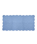 Rectangular blue placemat with scalloped edge on a white background