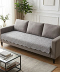 Gray sofa with a textured cover in a living room setting