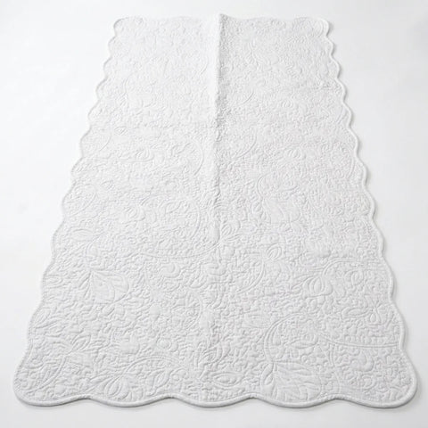 White textured rug on a white background