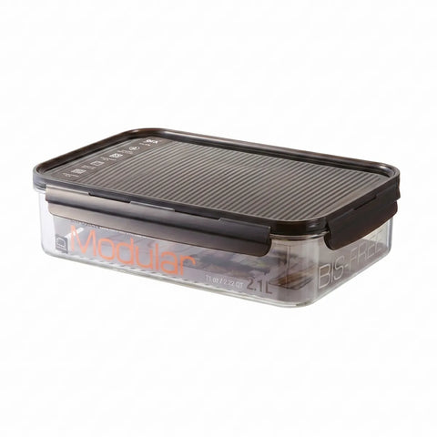 Clear food storage container with black lid on a white background