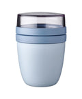 Light blue tumbler with a clear lid on a white background