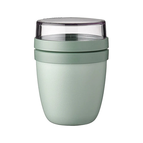 Green insulated tumbler with a clear lid on a white background