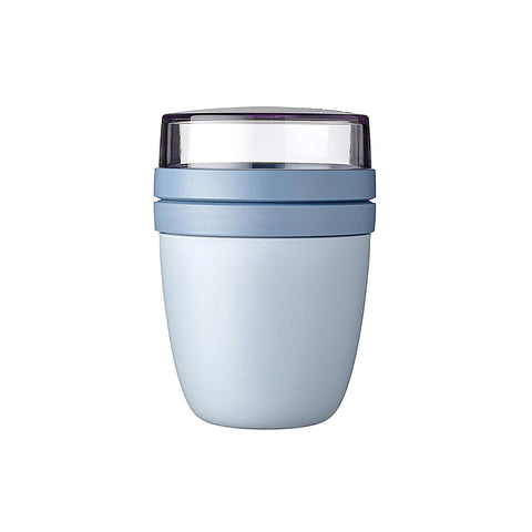 Light blue tumbler with a clear lid on a white background