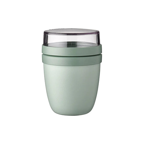 Green tumbler with a clear lid on a white background