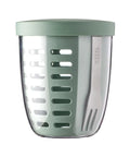 Mint green tumbler with a clear body on a white background