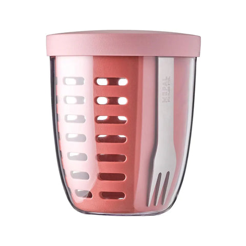 Pink and clear tumbler with a lid on a white background