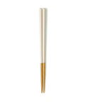 Pair of white and wooden chopsticks on a white background