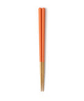 Pair of orange and wooden chopsticks on a white background