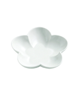 A white ceramic flower-shaped dish with five rounded petals, shown on a plain white background.