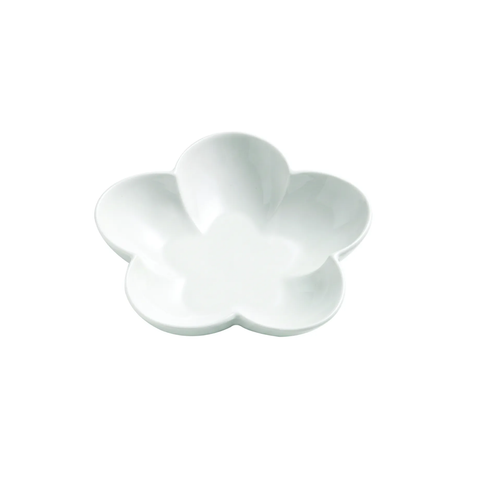 A white ceramic flower-shaped dish with five rounded petals, shown on a plain white background.