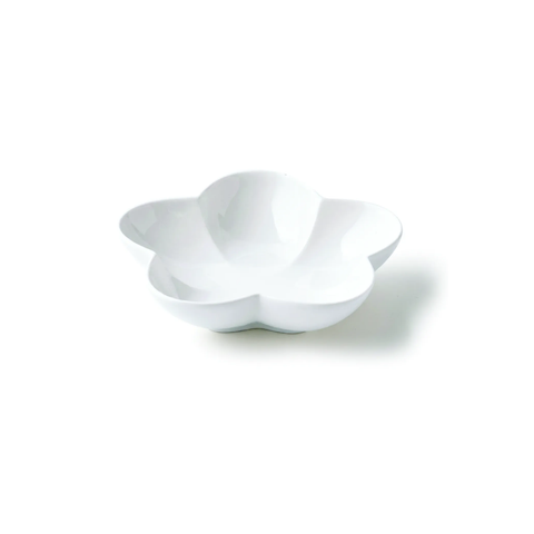 A white ceramic flower-shaped bowl with a glossy finish, photographed on a seamless white background with a soft shadow.