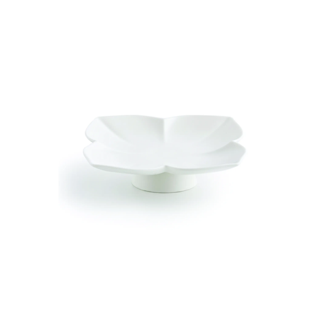A white ceramic flower-shaped dish with a pedestal base, photographed on a seamless white background.