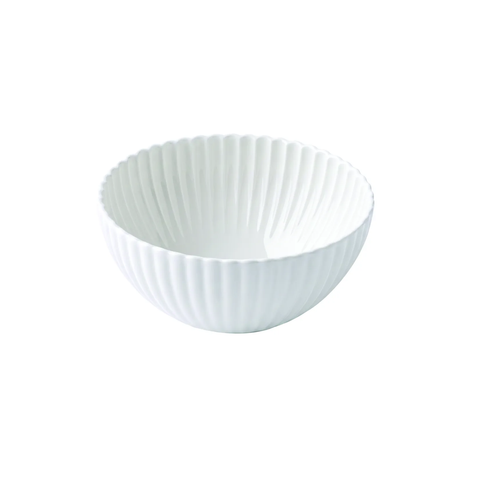 A white ceramic bowl with a fluted, ribbed exterior and a smooth, slightly tapered interior, shown against a plain white background.