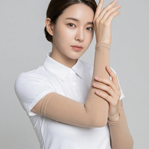 Woman wearing a beige arm sleeve against a gray background