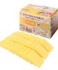 Yellow rectangular sponge cleaning blocks arranged in front of a product box with Japanese text on a white background.
