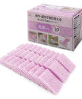 A box of pink reusable microfiber cleaning cloths with several individual cloths fanned out in front on a white background. The packaging has Japanese text and small demonstration photos.