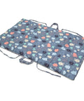 Foldable mat with cartoon monster pattern on a white background