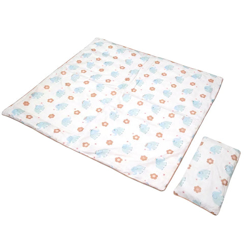 Baby mat with elephant pattern and matching pillow on a white background