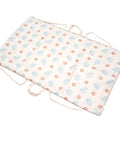 Floral and elephant patterned mat with straps on a white background