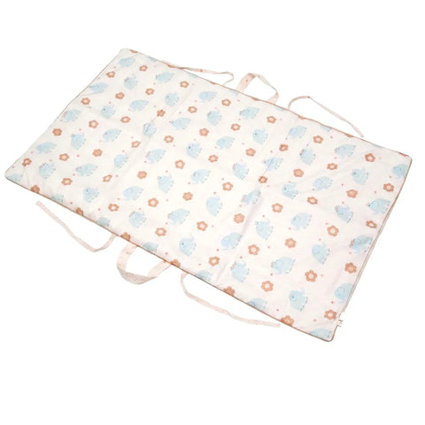 Floral and elephant patterned mat with straps on a white background