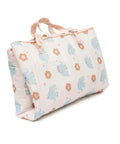 Floral and elephant patterned bag on a white background