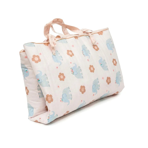 Floral and elephant patterned bag on a white background
